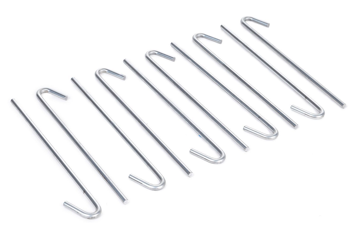 A row of metal stakes on a white background.