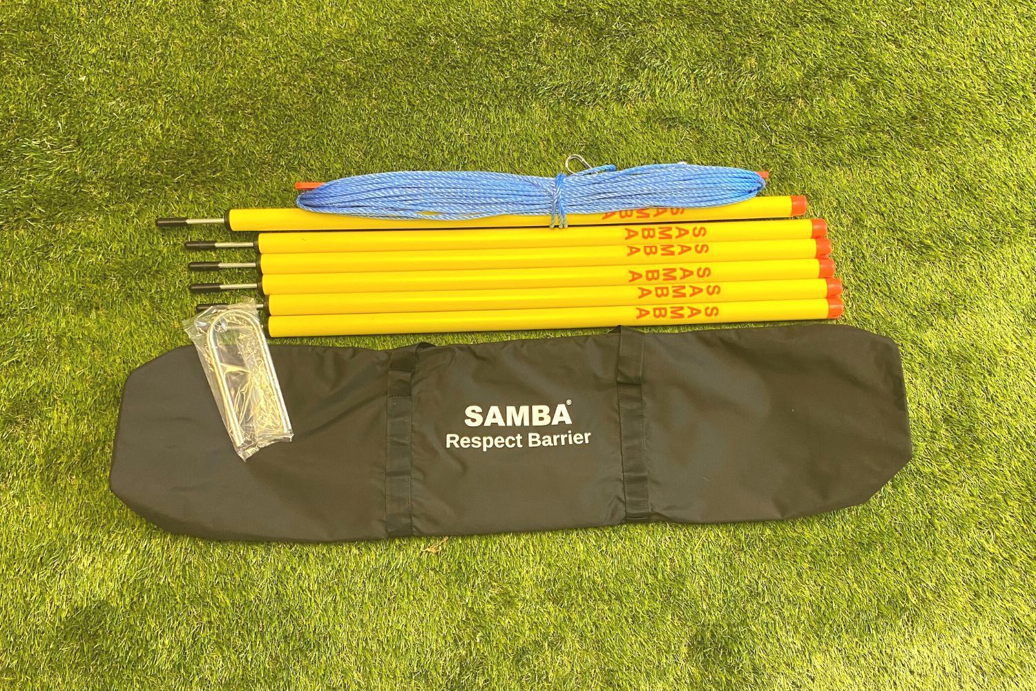 A set of samba poles in a black bag