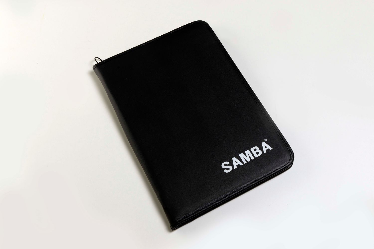 A clipboard with a soccer field drawn on it