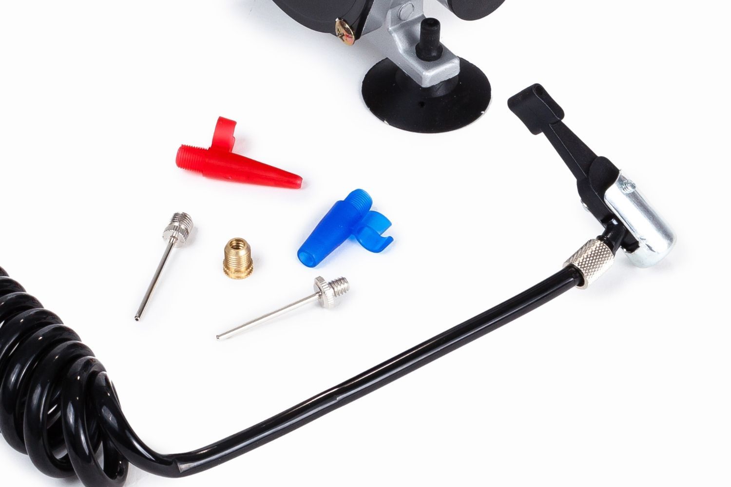 A small air compressor with a hose attached to it