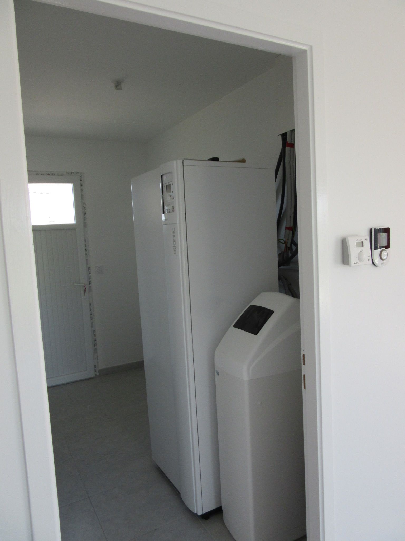 Installation de pompe à chaleur et adoucisseur