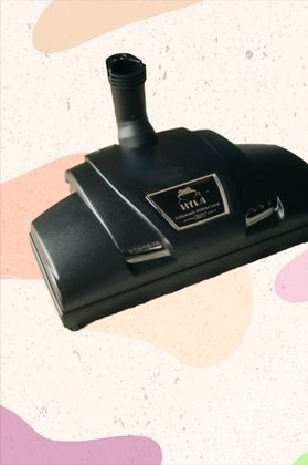 A black vacuum cleaner with a label that says mala