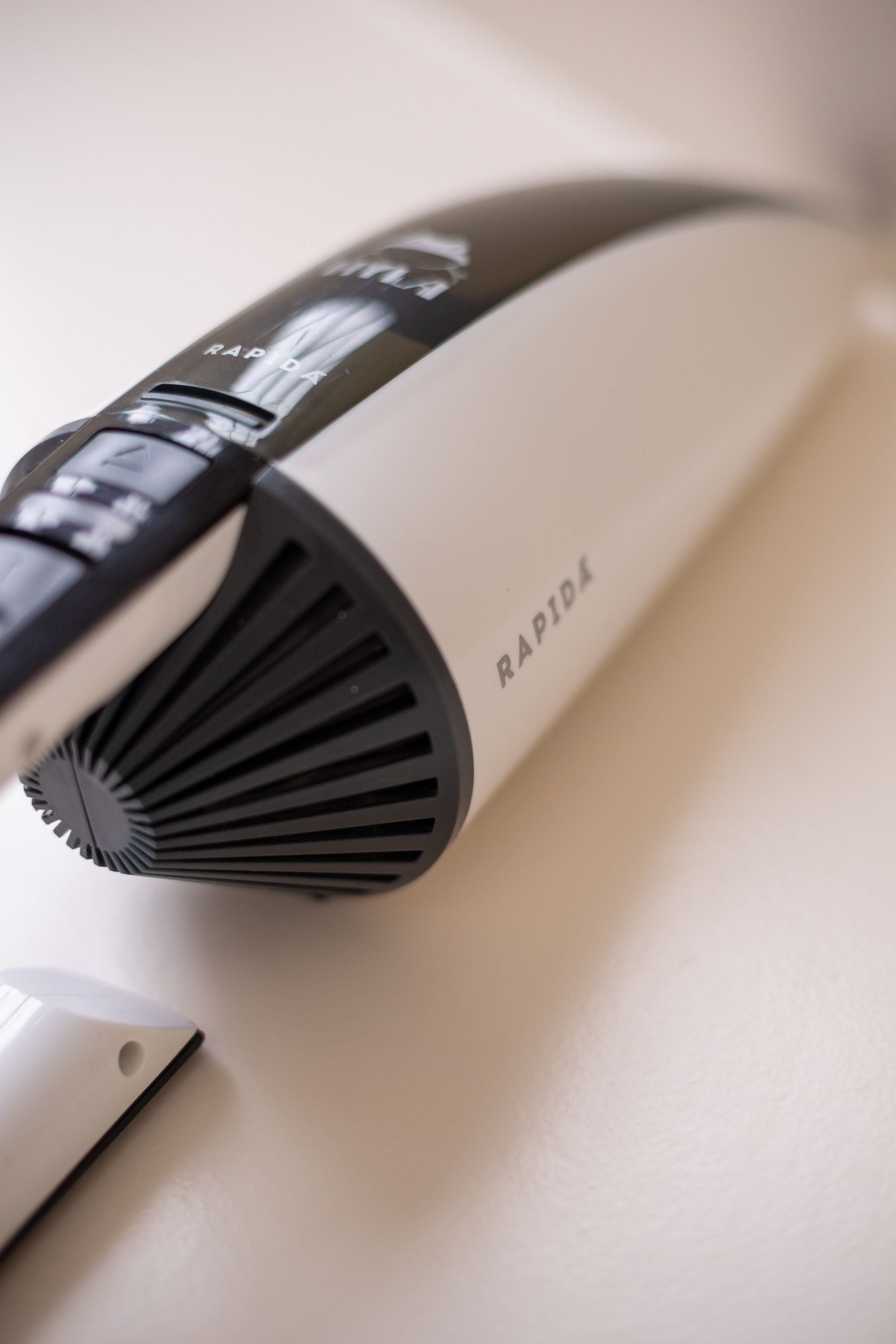 A close up of a rapid4 cordless vacuum cleaner