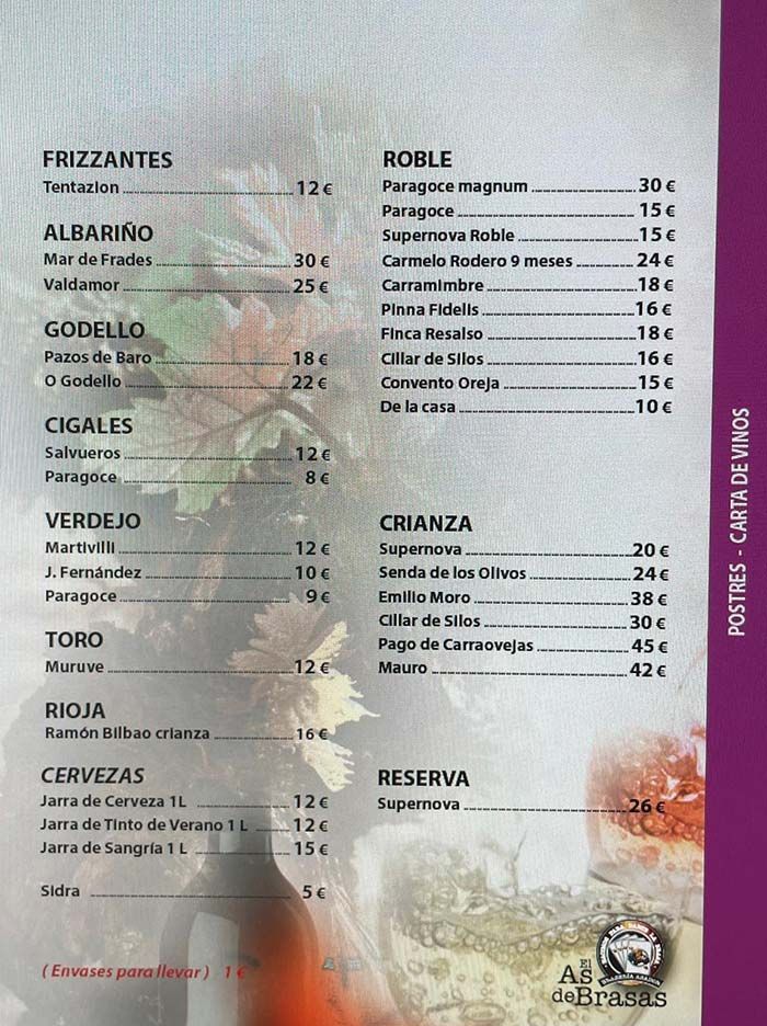 Carta de vinos con secciones para vinos espumosos, blancos y tintos, incluidos precios en euros; fondo morado.
