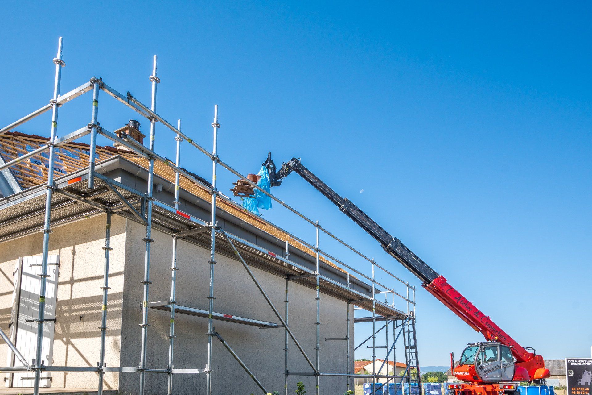Installation de toiture à l'aide d'un véhicule
