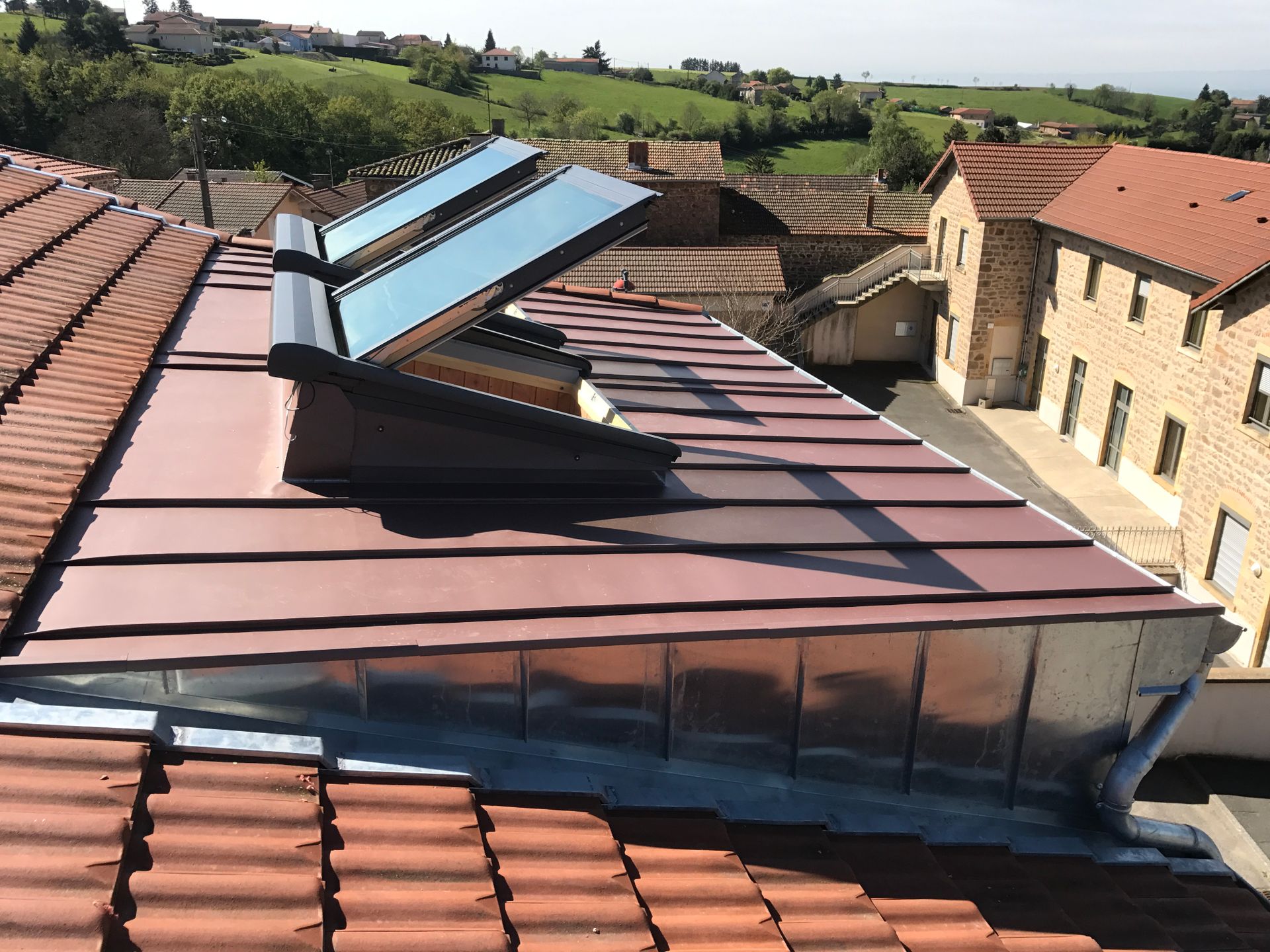 Rénovation de toiture et pose de fenêtre de toit