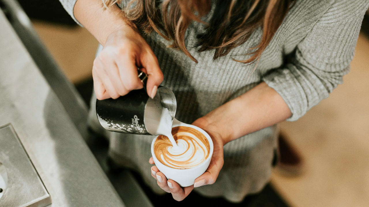 A deliciously made cup of coffee decorated with foamed milk