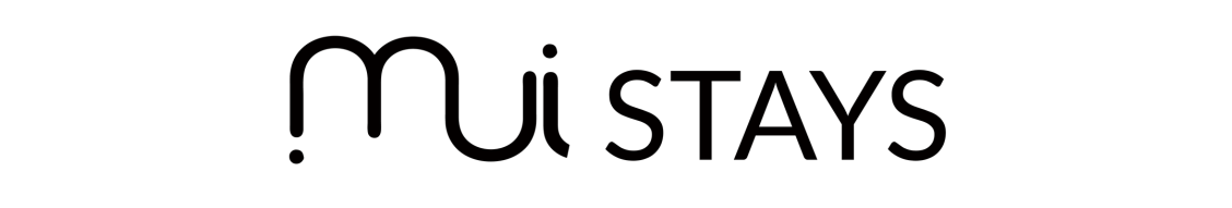 A black and white logo for mui stays on a white background