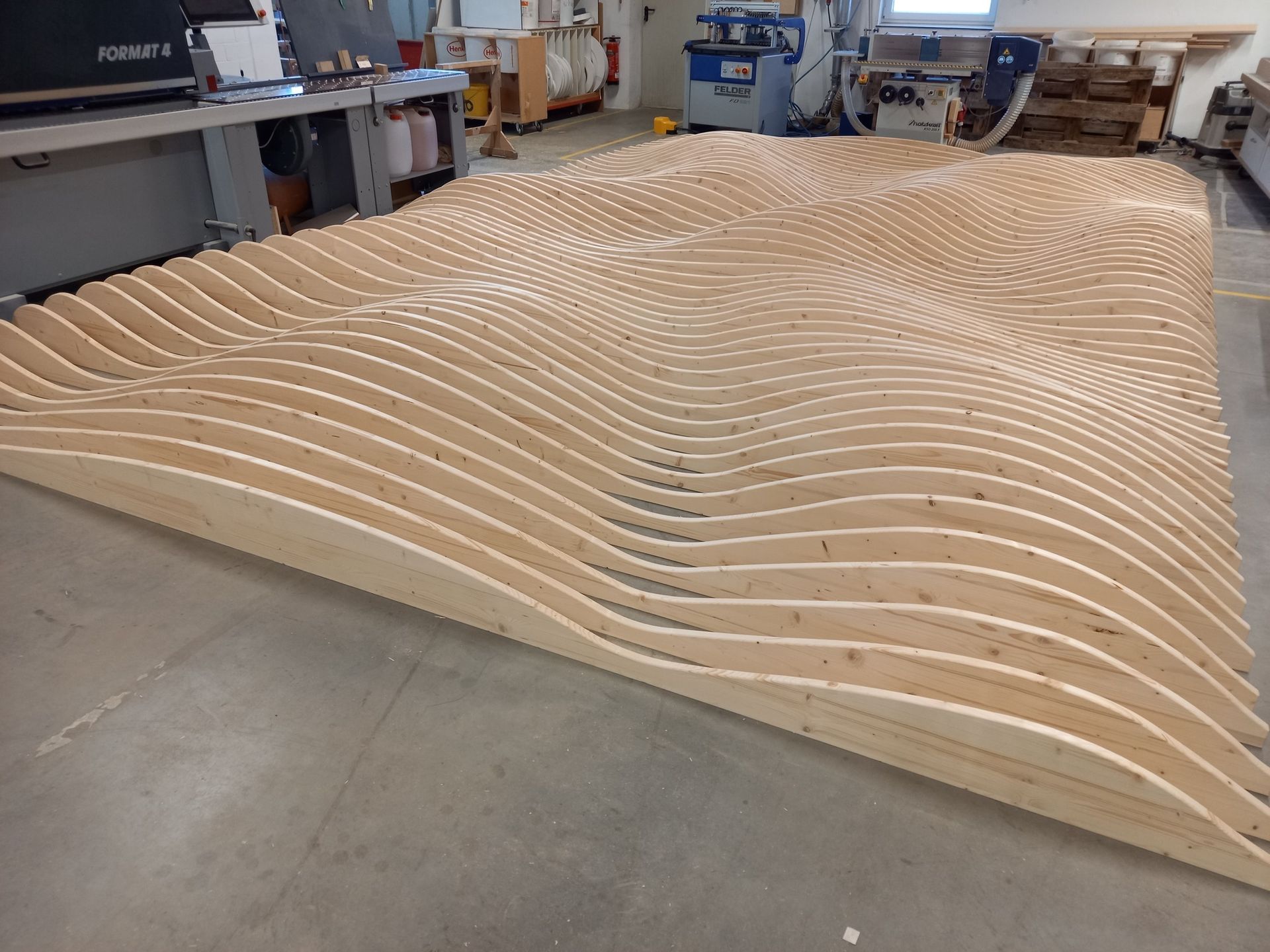 Schalldämmung wellenförmig Schreinerei Heinrich Brückner GmbH & Co. KG