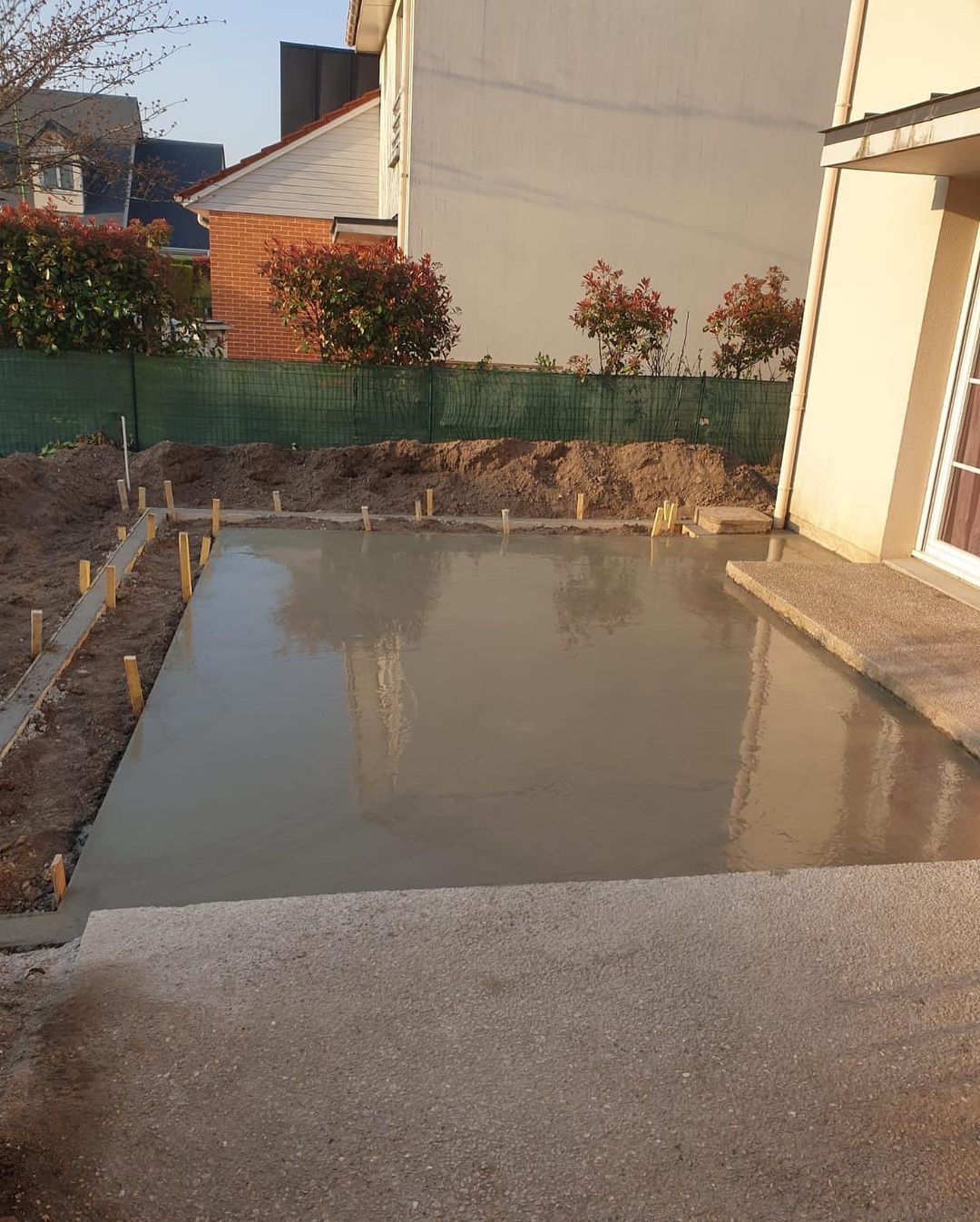 Coulage d'une dalle en béton pour une terrasse