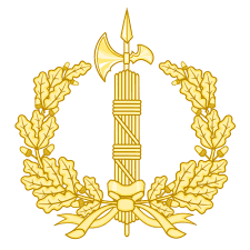 Fasces dorados con hacha, rodeados de hojas de roble y cinta.