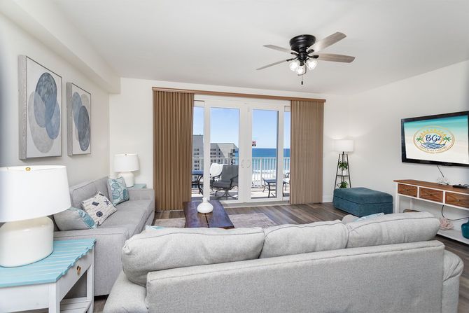 Open-concept living and kitchen area at a Shores of Panama vacation condo, Panama City Beach