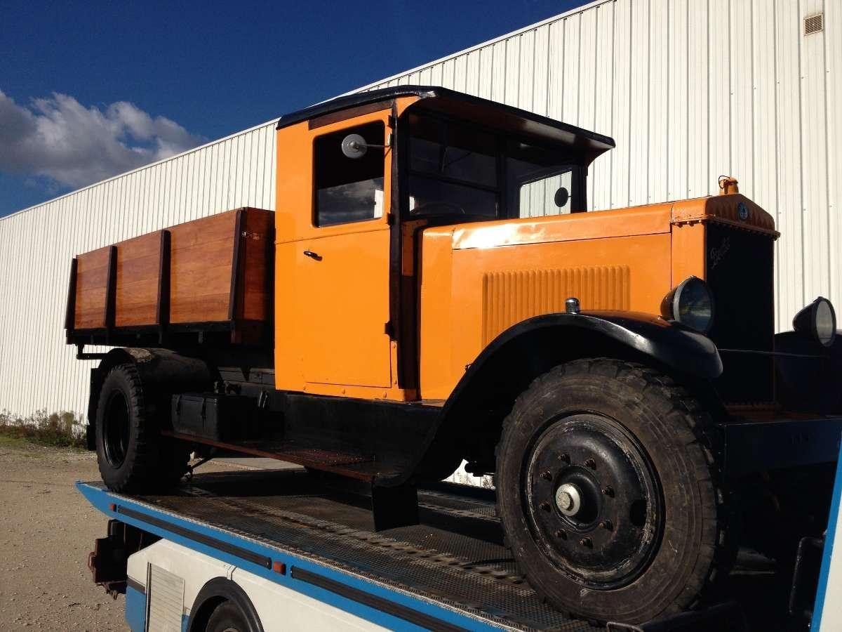 Charger ou décharger n'importe quels véhicules dans un conteneur