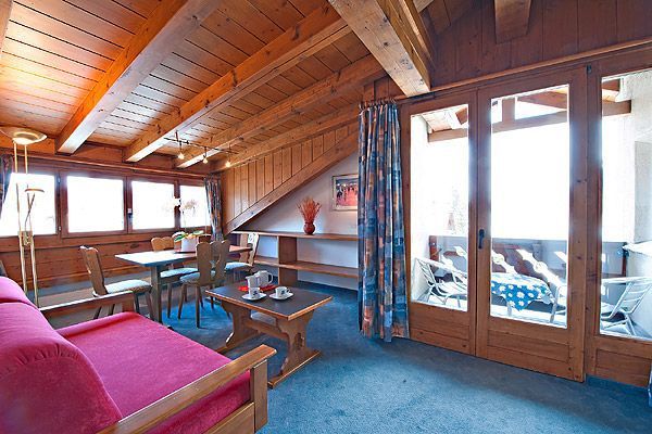 Suite Engiadina mit Balkon Wohnzimmer - Hotel Chesa Grischa in Sils-Baselgia