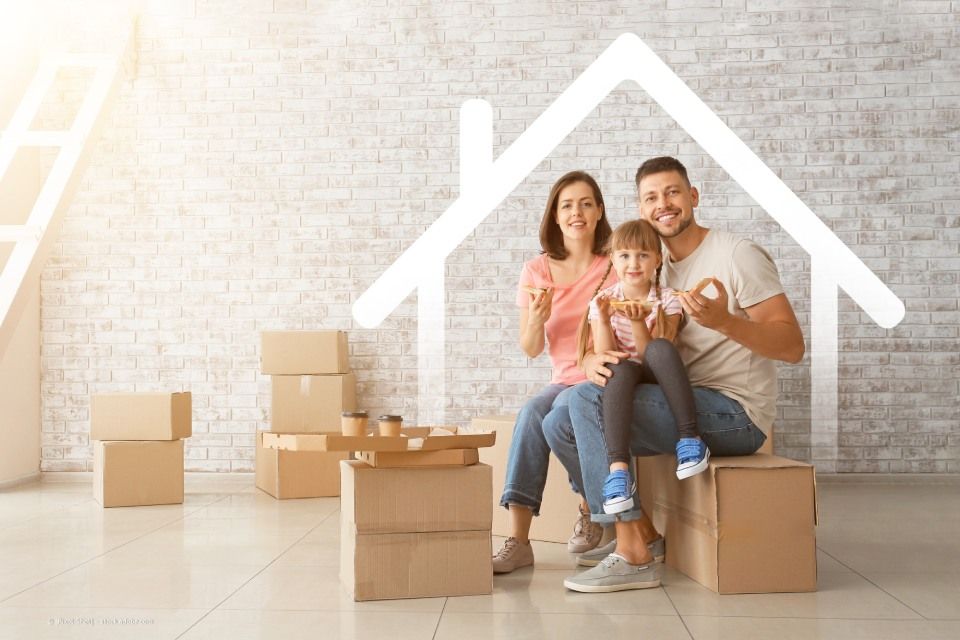 Junge Familie im neuen Haus