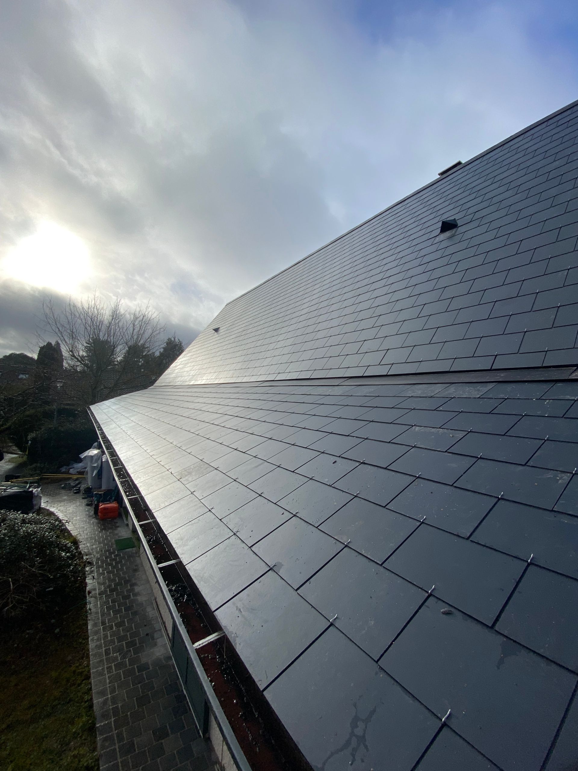 Rénovation d'une toiture en ardoise