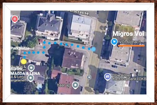 Eine Luftaufnahme eines Wohngebiets mit Gebäuden und Bäumen