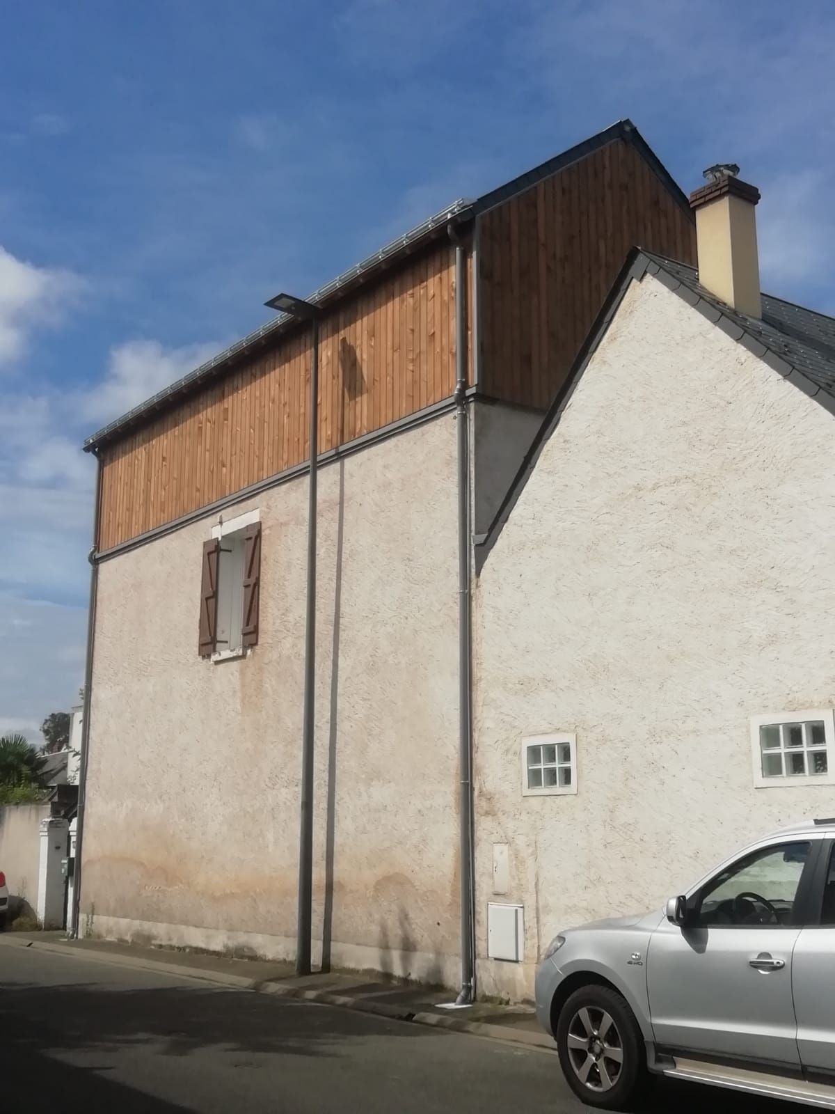 Surélévation en ossature bois sur une maison en ville