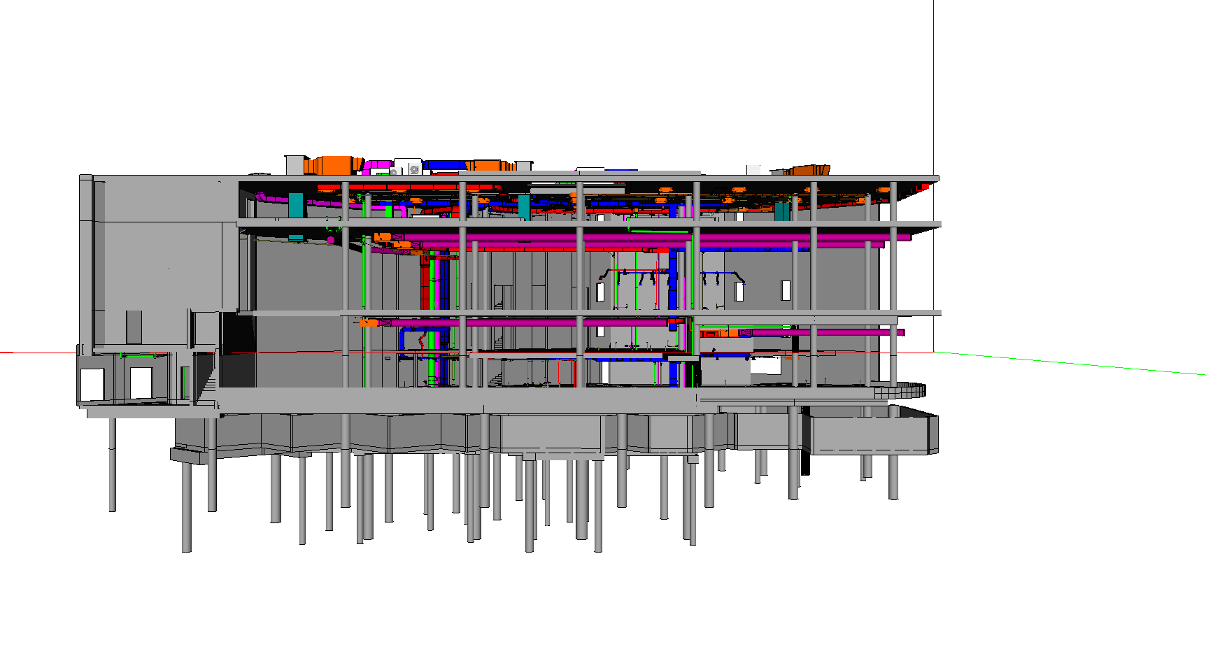 Vue latérale d'une maquette architecturale/structurelle d'un bâtiment à plusieurs étages avec une structure grise et des éléments intérieurs colorés.