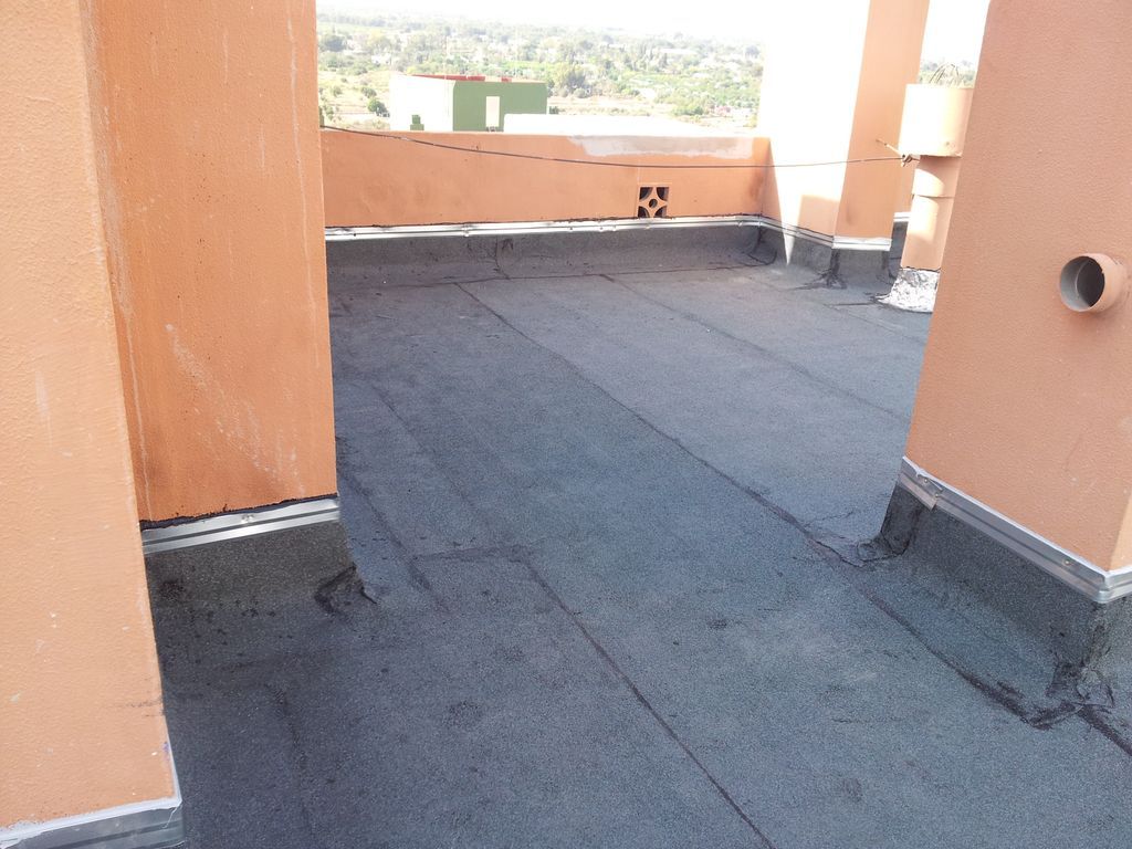instalacion de perfiles metalicos  vierte aguas en terraza con lamina de pizarra