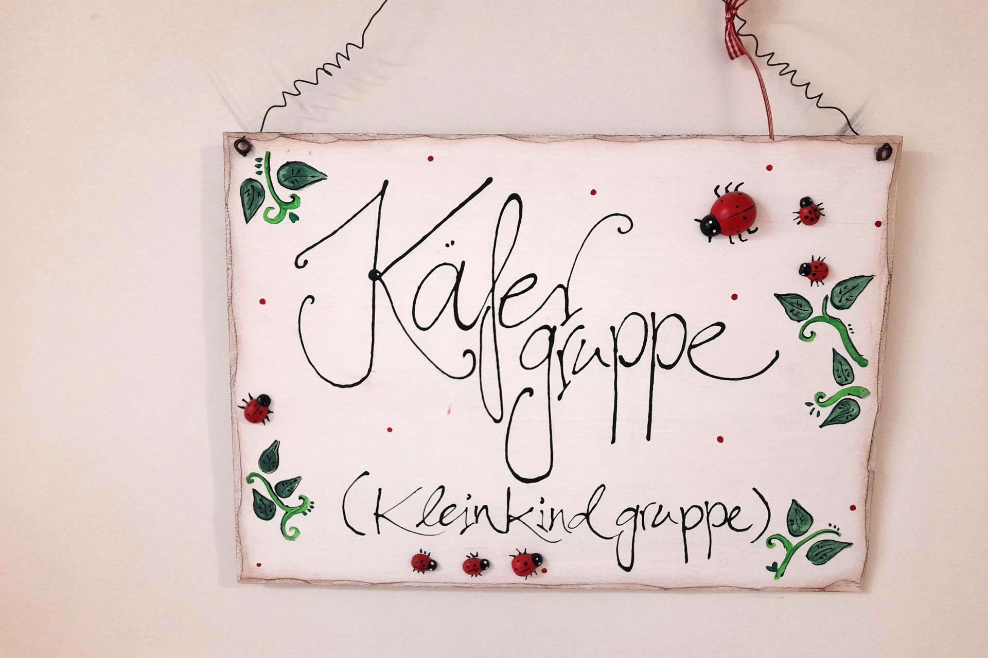 Schild der Käfergruppe (Kleinkindgruppe) in der Krippe St. Elisabeth