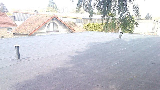 Étanchéité de toit sur maison de quartier