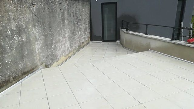 Étanchéité avec protection des dalles sur plots