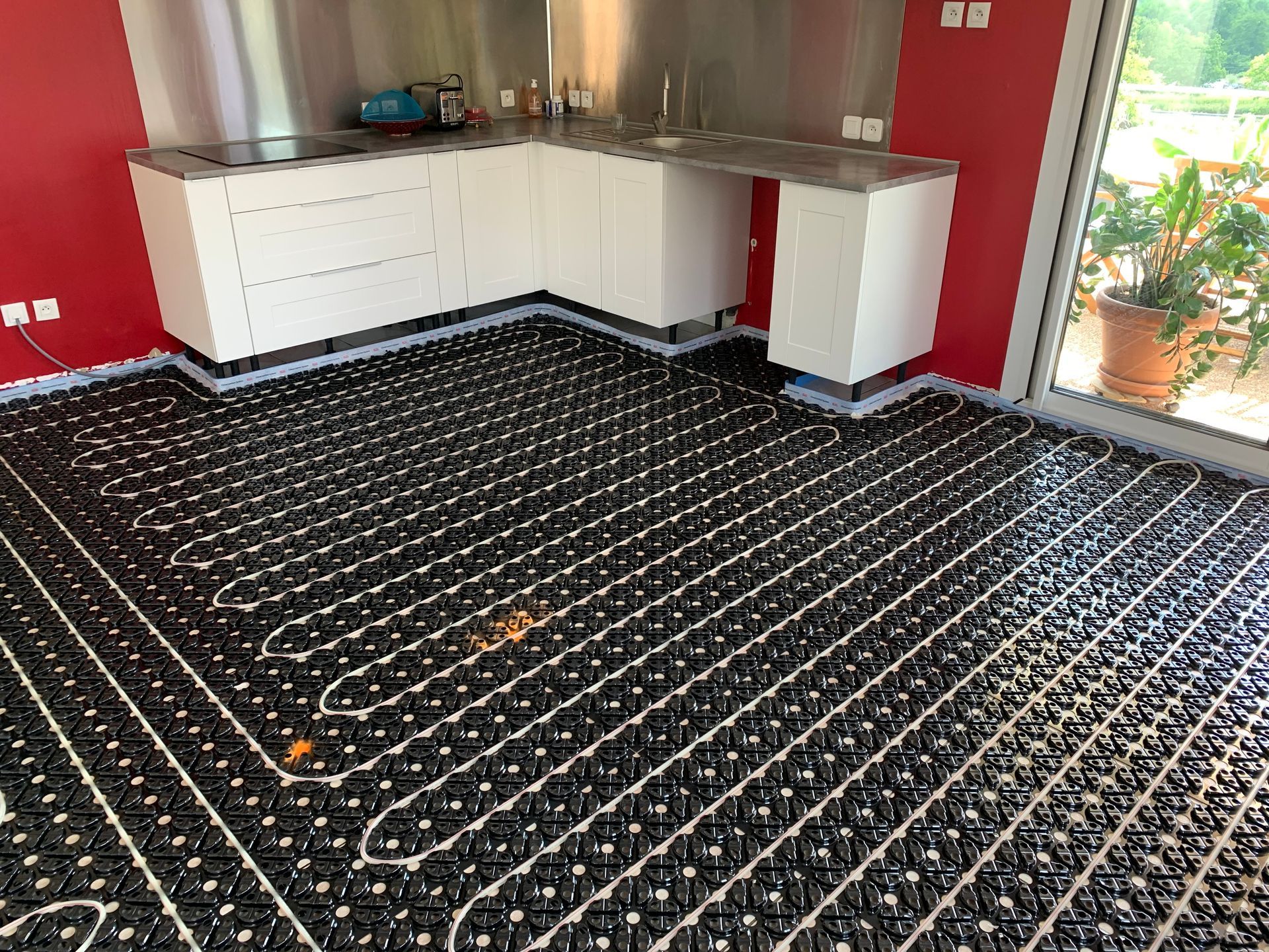 Pose de plancher chauffant électrique faible épaisseur