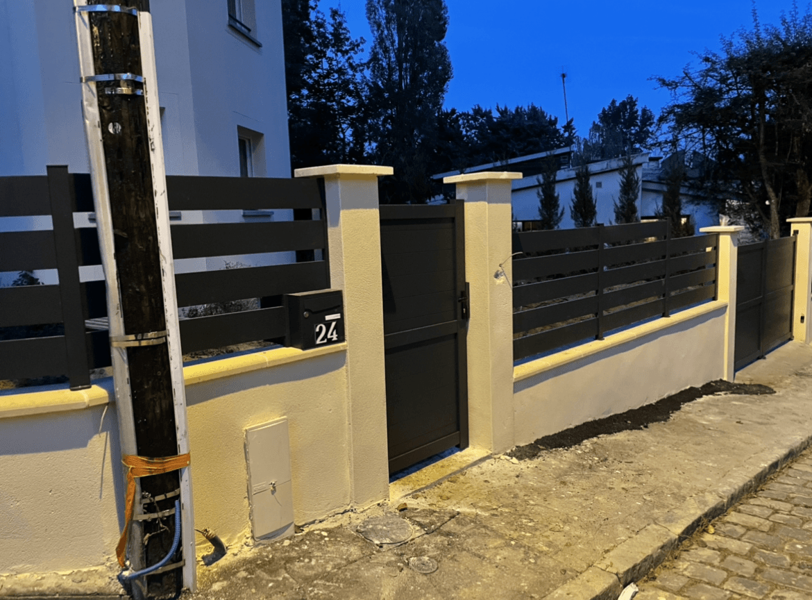 Fin de chantier de muret et pose de barrières