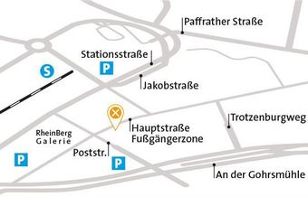 Karte von Rheinberg mit Straßen, Fußgängerzone, Parkplätzen und Bahnhofssymbol.