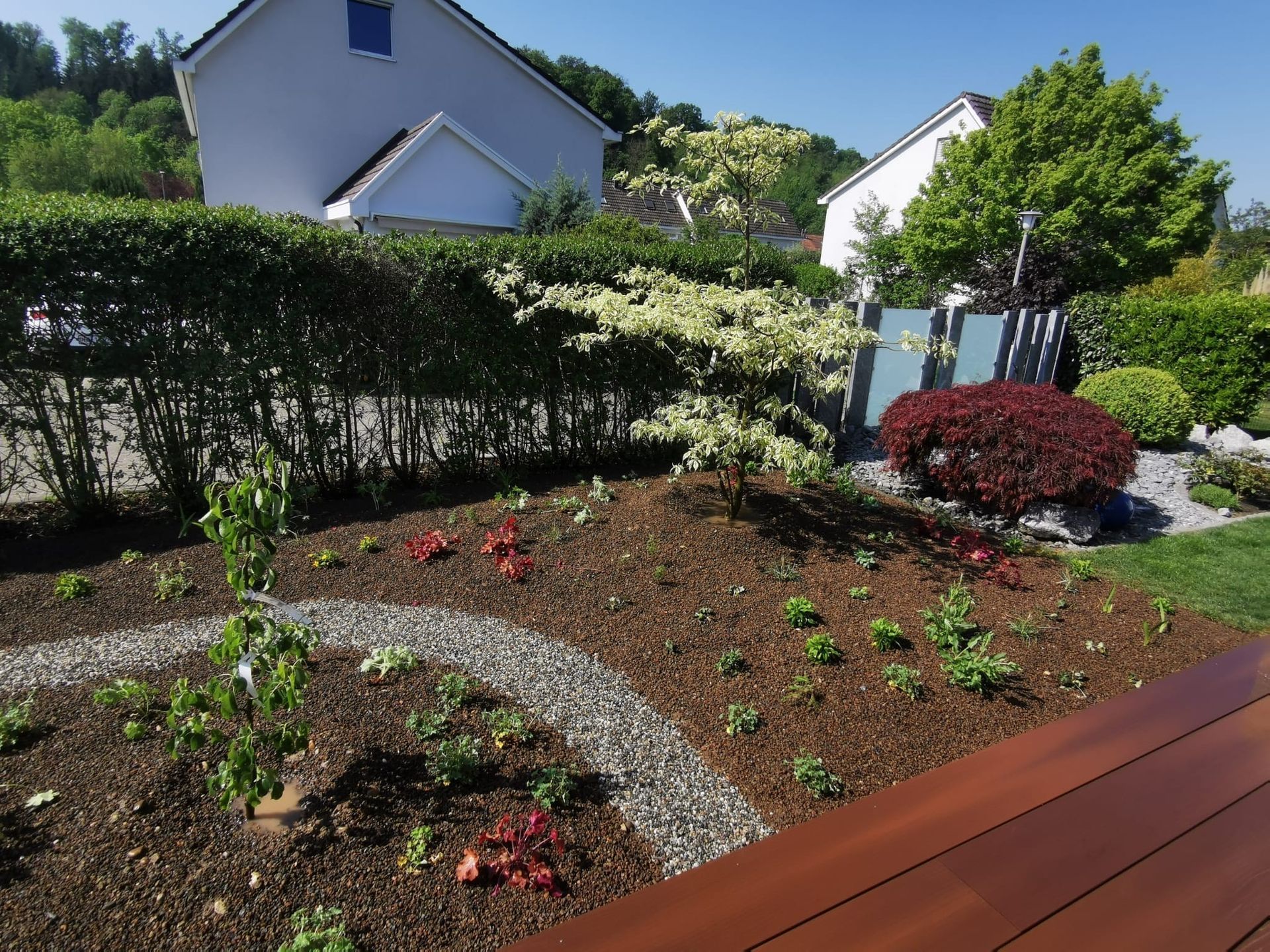 Professionelle Gartengestaltung von Bison Gartenbau AG in Muttenz, Basel, Liestal, Sissach, Pratteln und der Region Basel. Hochwertige Gartenplanung und Landschaftsbau für Ihr Zuhause.