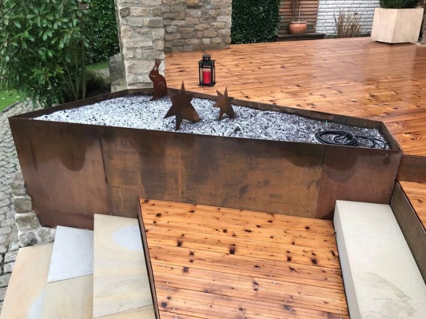 Arne Meissner Gartenmanufaktur Dortmund Terrasse mit Holzboden und Wasser