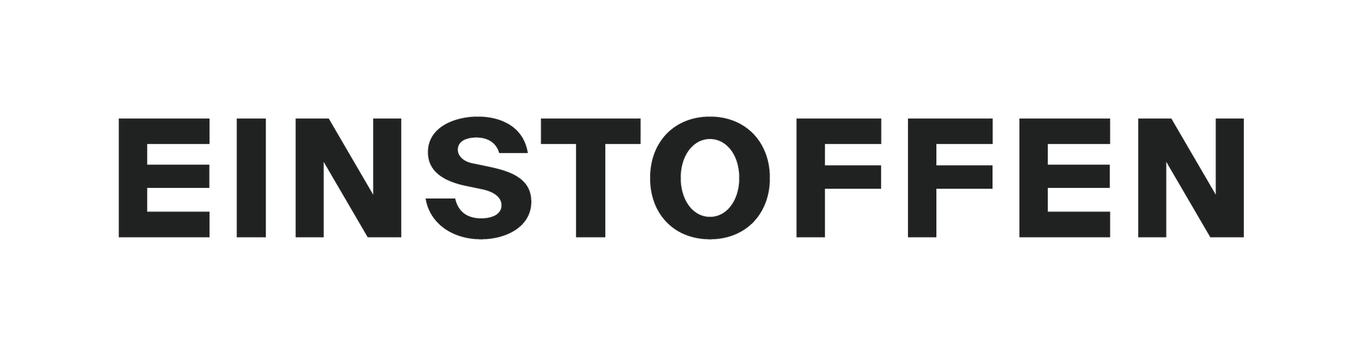 Das Wort „Einstoffen“ steht in schwarzer Schrift auf weißem Hintergrund