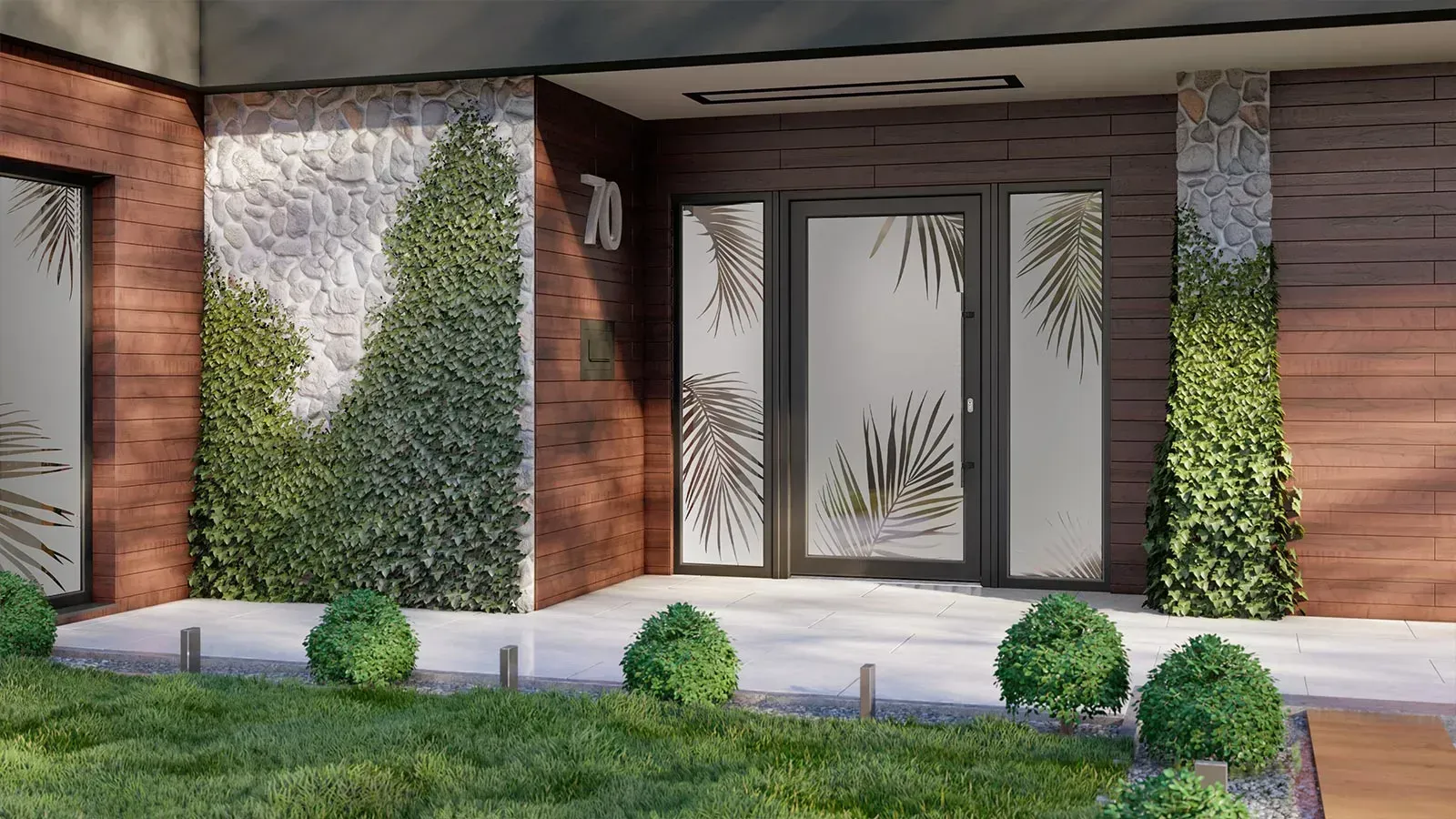 Vordereingang eines modernen Gebäudes mit Milchglastür, Grünpflanzen, Ziegel- und Steinakzenten und gepflegtem Rasen.