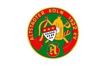 Das Logo der Altstadt Köln ist ein grüner Kreis mit einem roten Band darum.