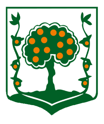 Un escudo verde con un árbol con puntos naranjas.