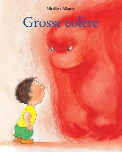 Un petit enfant se tient devant un monstre rouge menaçant et amorphe, la couverture du livre intitulé « Grosse colère » de Mireille d'Allancé.