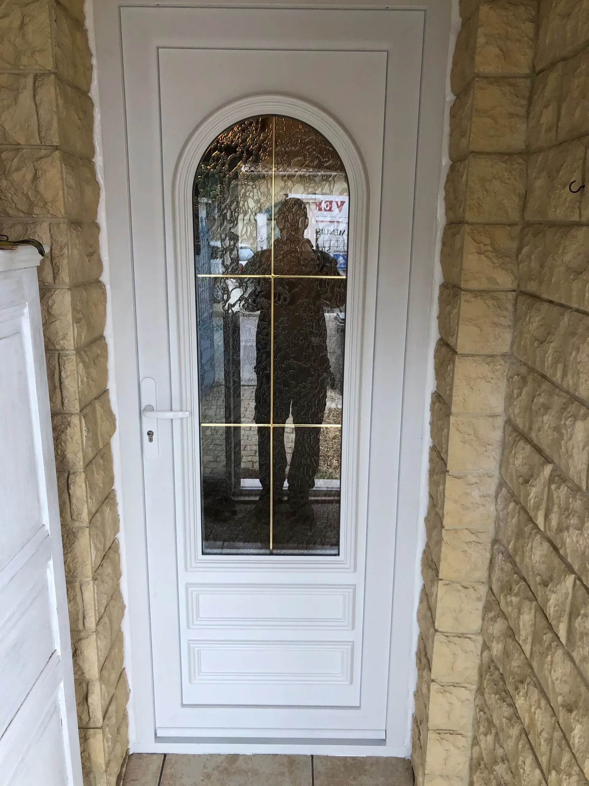 Porte d'entrée avec vitre centrale