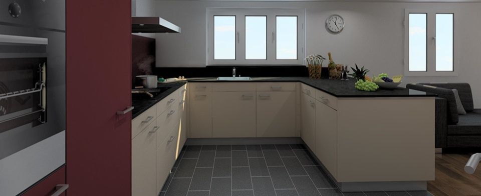 Eine Küche mit einer Spüle und einer Uhr an der Wand.