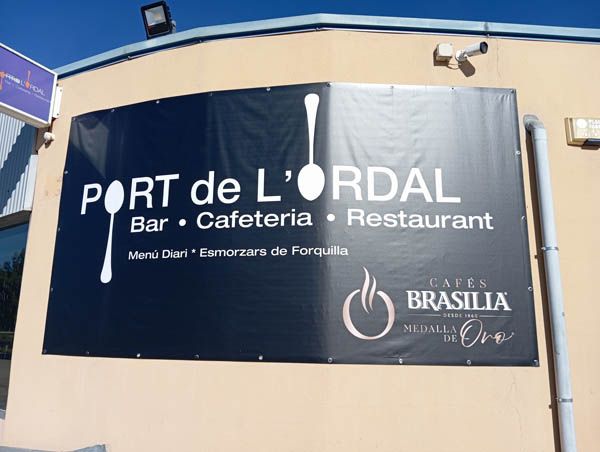 A sign for port del ordal bar cafetería restaurante