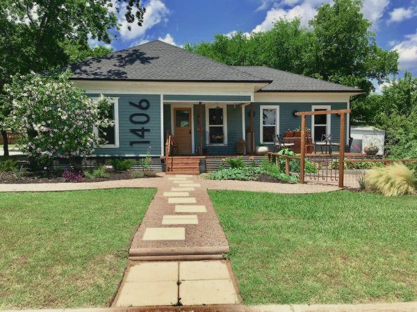A house with the number 1406 painted on the side of it
