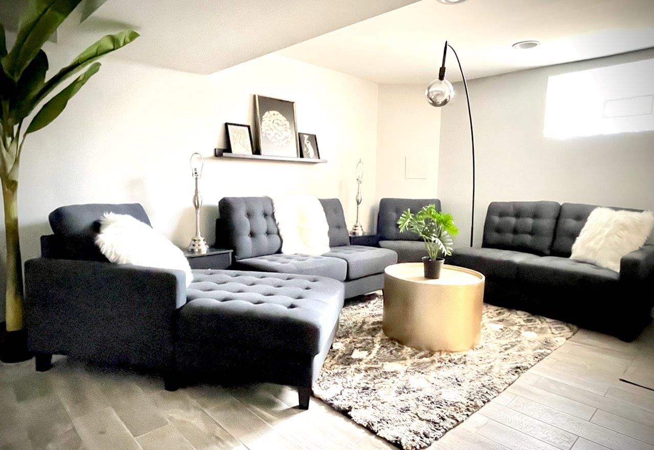 A living room filled with furniture and a coffee table.