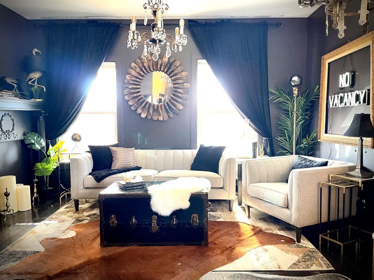 A living room with a sign that says no vacancies