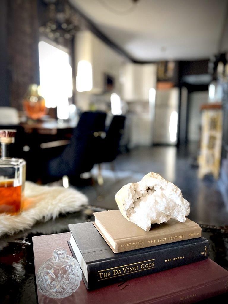 A stack of books sitting on top of each other on a table.