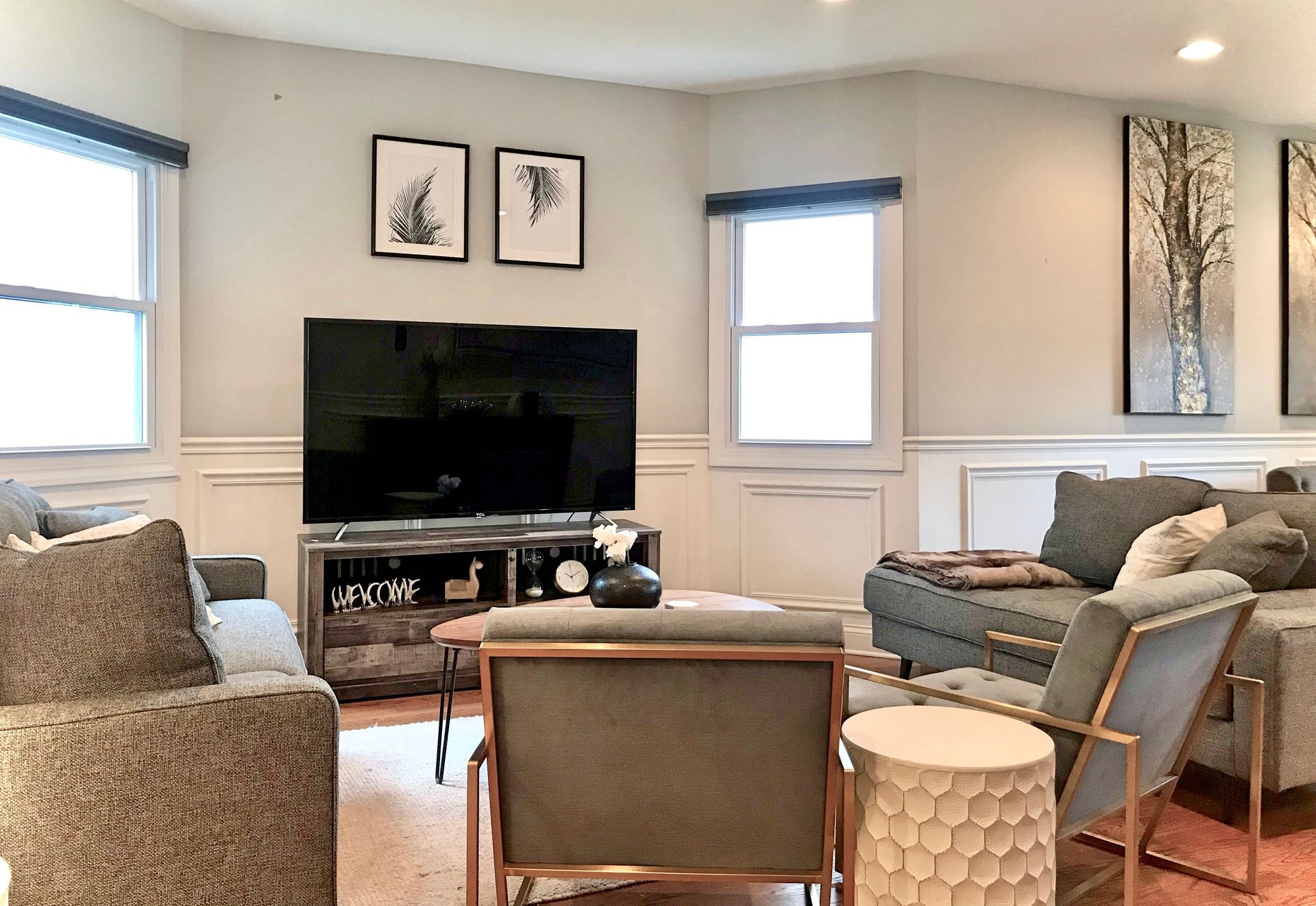A living room filled with furniture and a flat screen tv.