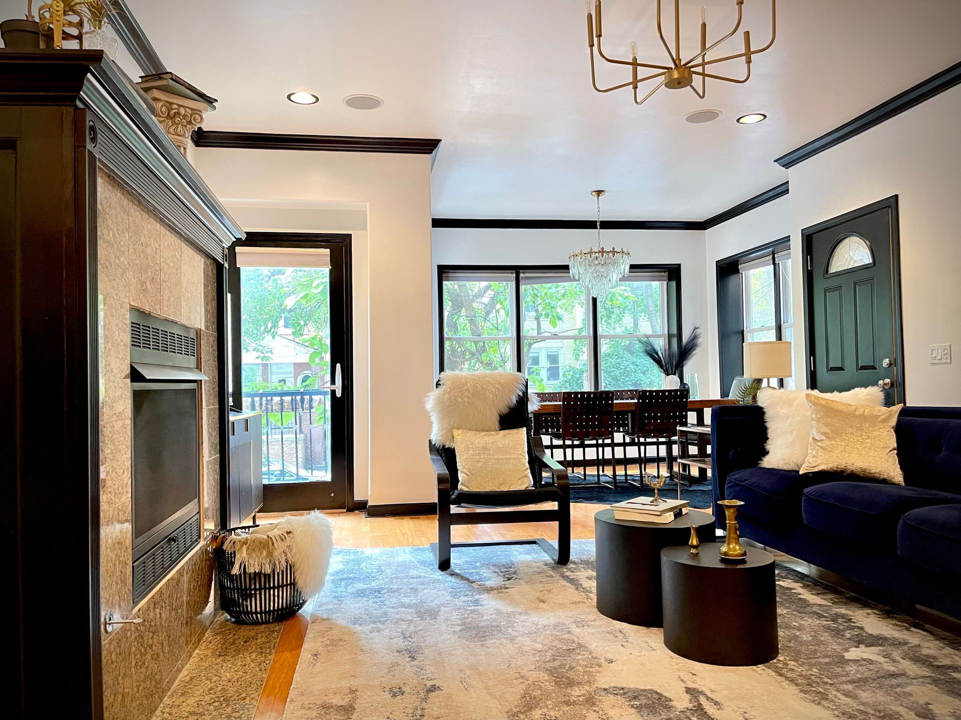 A living room filled with furniture and a fireplace.