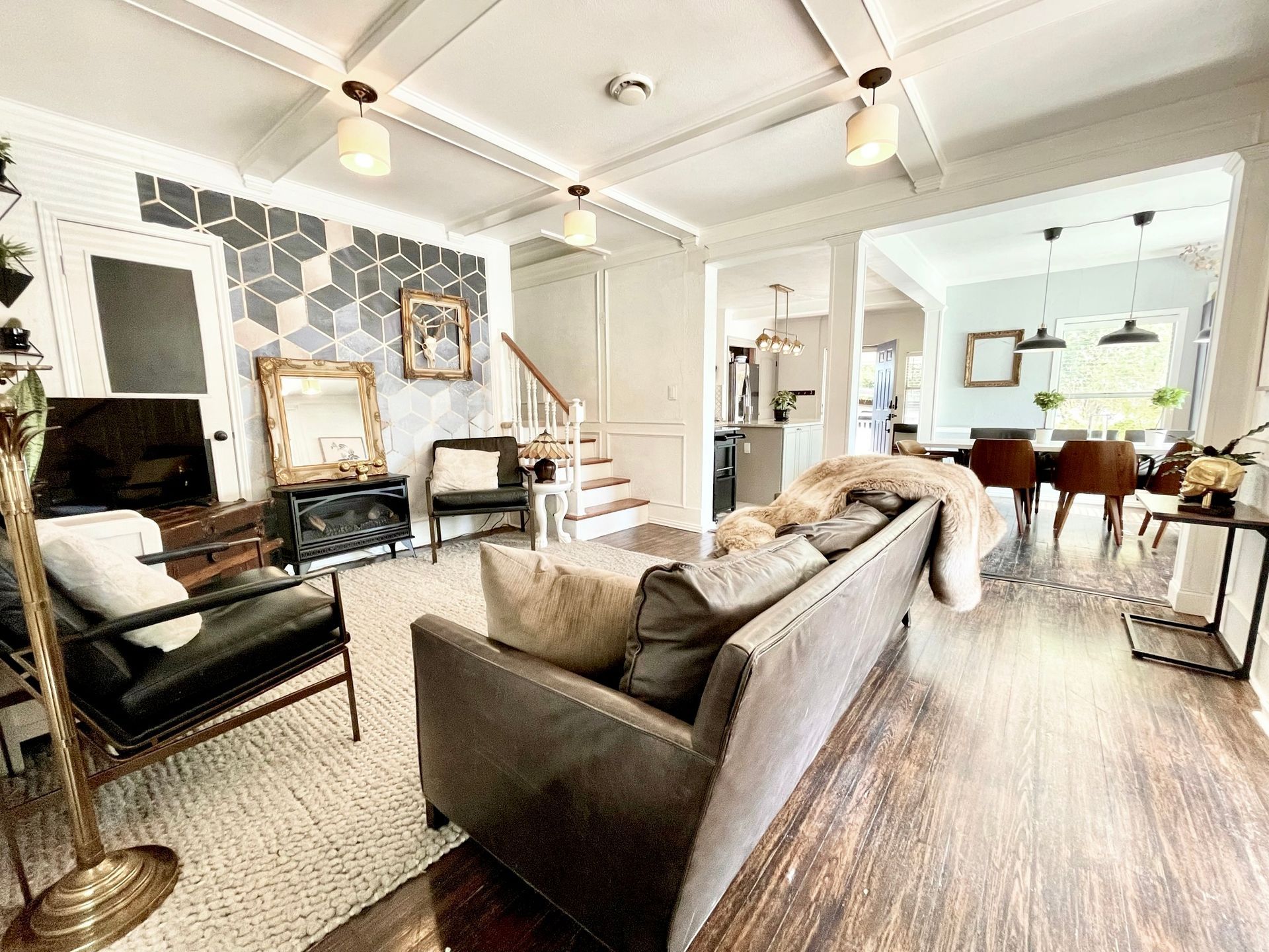 A living room filled with furniture and a couch.