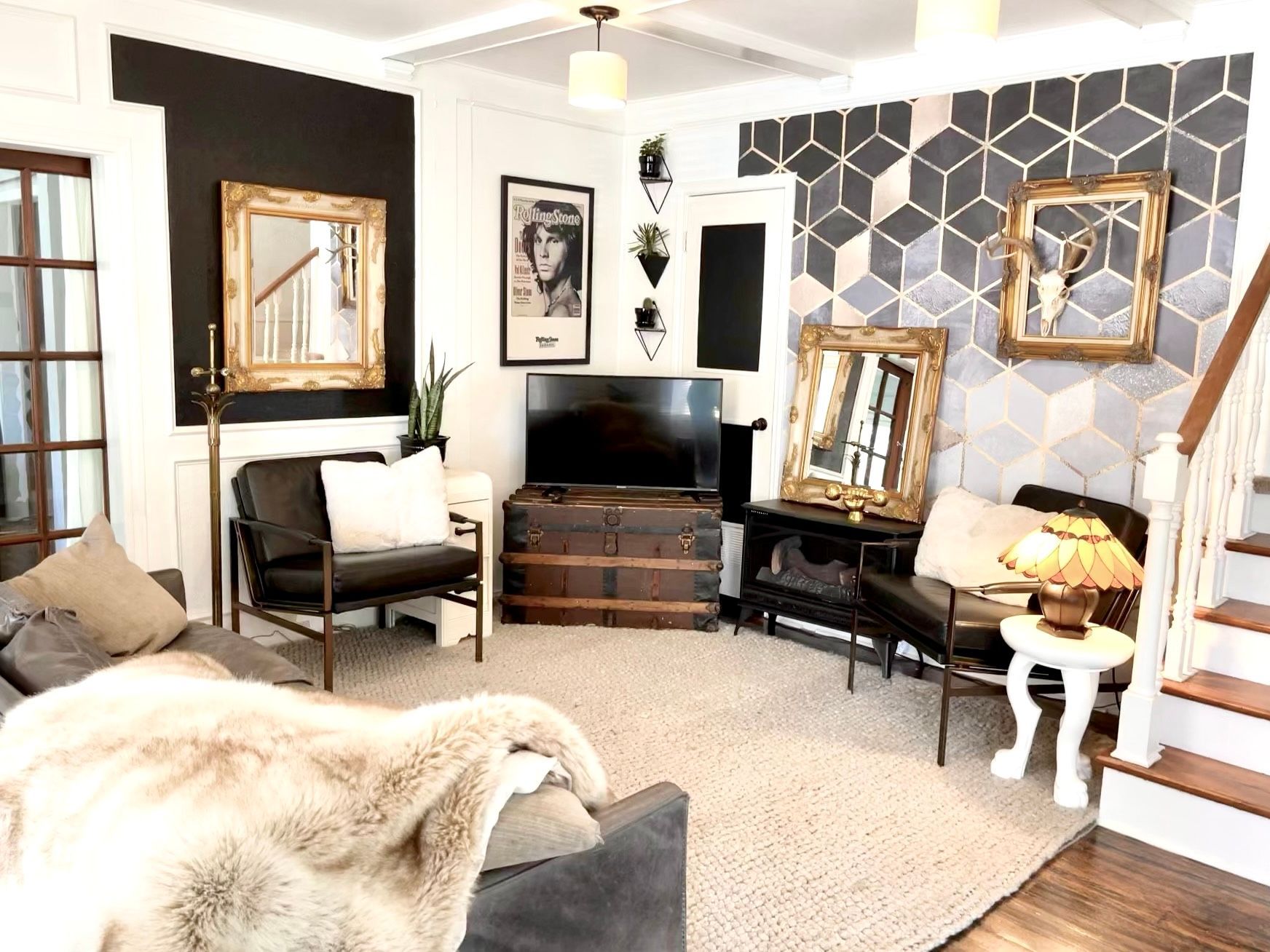 A living room filled with furniture and a flat screen tv.