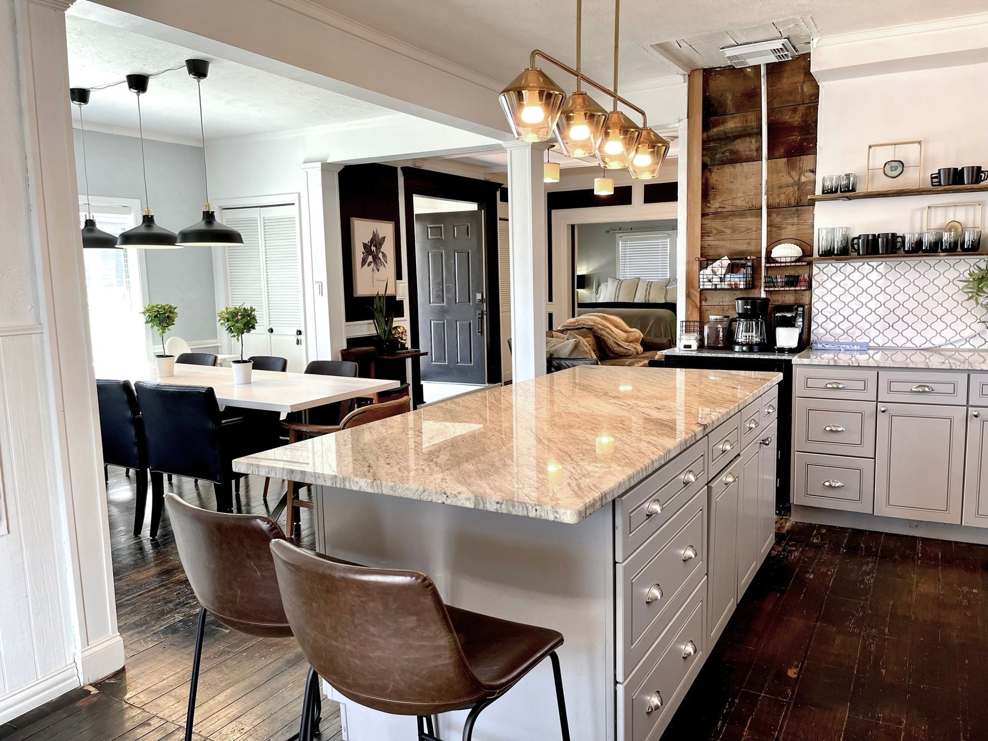 There is a large island in the middle of the kitchen.