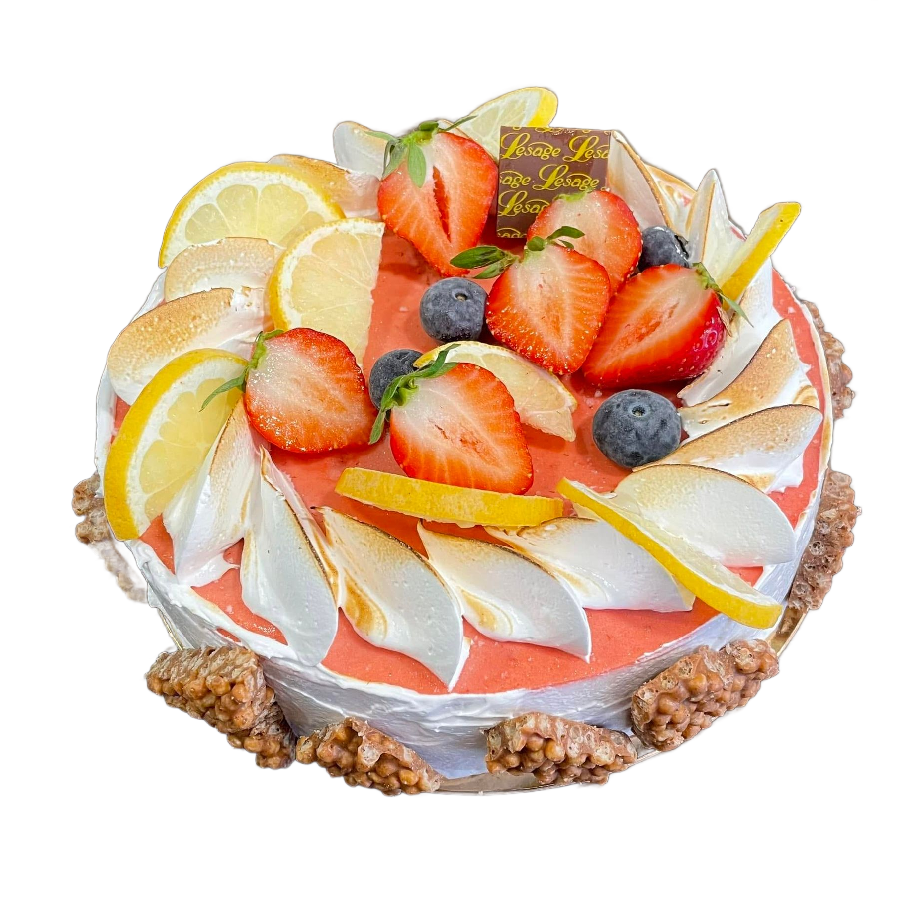 Gâteau à la crème garni de fraises, de tranches de citron, de myrtilles.